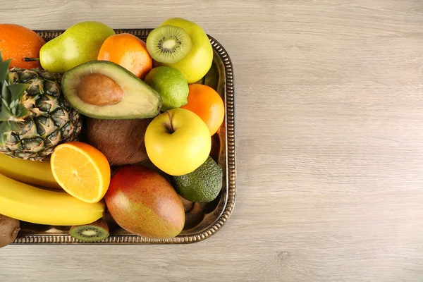 Assortment of fruits on wooden table — Stock Photo, Image