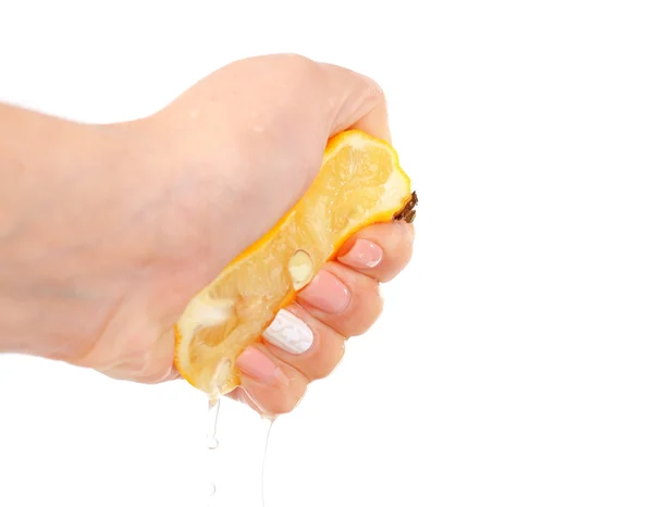 Female hand squeezing lemon isolated on white — Stock Photo, Image