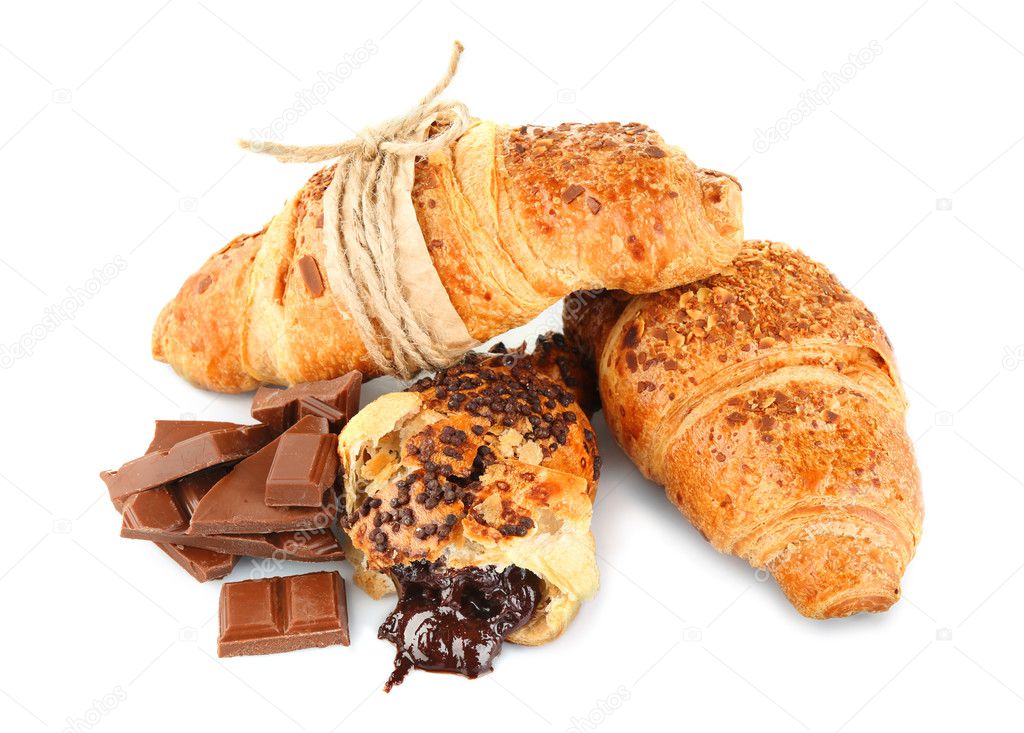 Fresh and tasty croissants with chocolate, isolated on white
