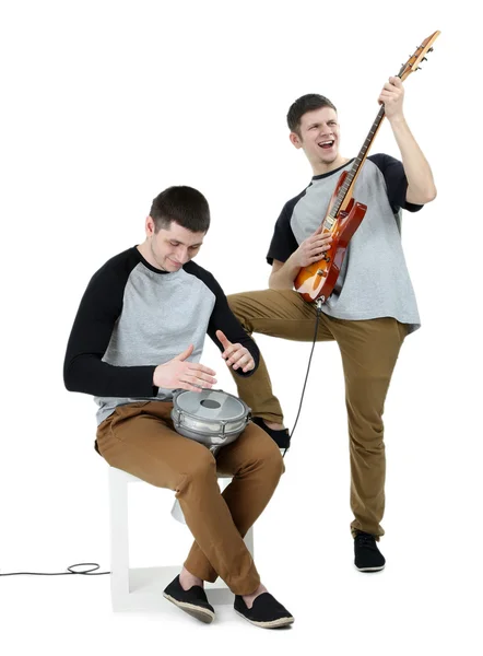 Two handsome young men with musical instruments isolated on white — Stock Photo, Image