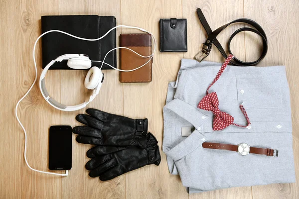 Still life of casual man on wooden background — Stock Photo, Image