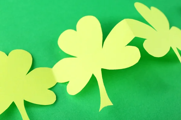 Shamrock leaves on green background — Stock Photo, Image