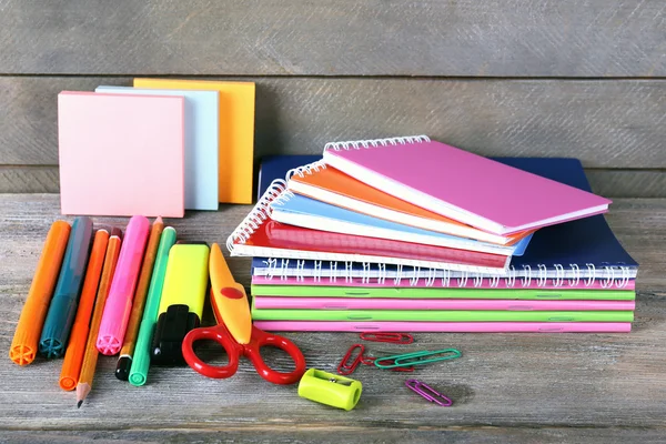 Colorful stationery on wooden background — Stock Photo, Image