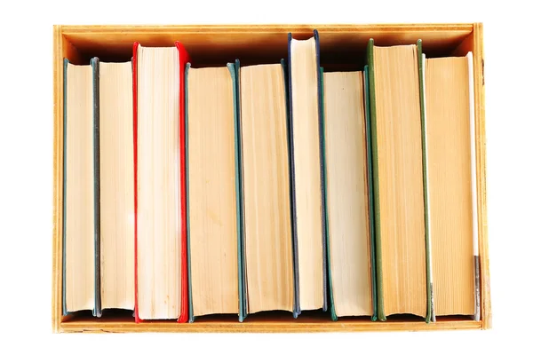 Книги в дерев'яній коробці, вид зверху — стокове фото
