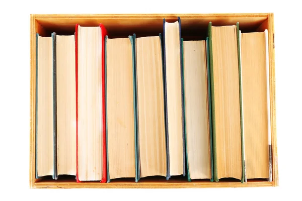 Books in wooden box, top view — Stock Photo, Image