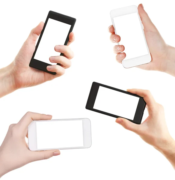 Hände, die Smartphones isoliert auf weiß halten — Stockfoto