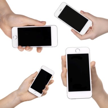 Akıllı telefonlar üzerinde beyaz izole holding eller