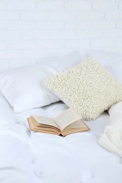 Book on bed close-up — Stock Photo, Image