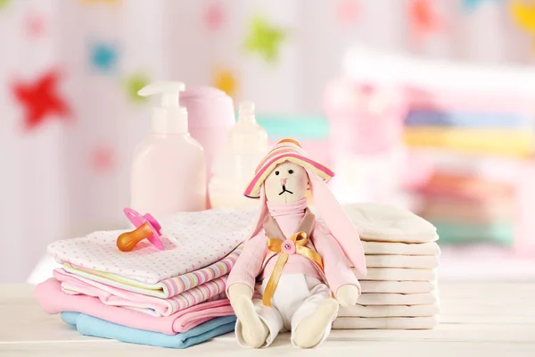 Baby accessories on table on light background — Stock Photo, Image