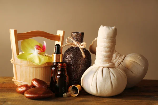 Spa still life on wooden table on brown background — Stock Photo, Image