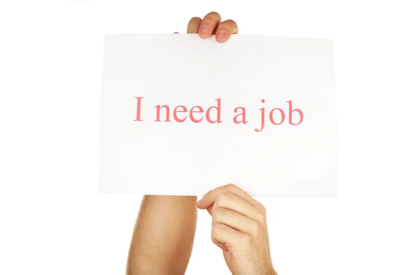 Vel papier met inscriptie een baan in mannelijke handen geïsoleerd op wit Ibehoefte — Stockfoto