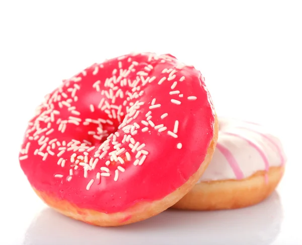 Delicious donuts with icing isolated on white — Stock Photo, Image