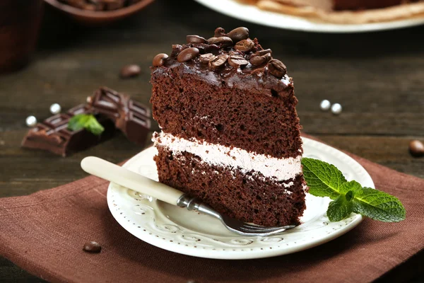 Delicious chocolate cake on table close-up — Stock Photo, Image