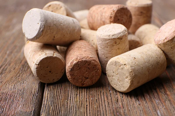 Wine corks on wooden background — Stock Photo, Image