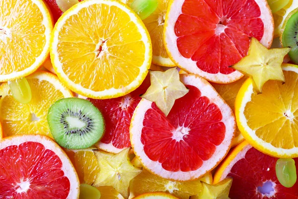 Fondo de frutas en rodajas — Foto de Stock