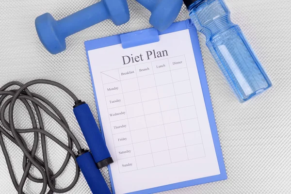 Diet plan and sports equipment top view close-up — Stock Photo, Image