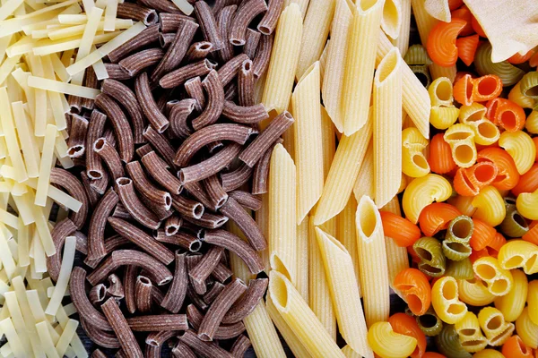 Diversi tipi di pasta, macro vista — Foto Stock