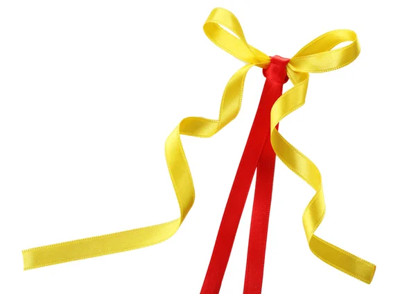 Colorful red and yellow ribbons with bow isolated on white — Stock Photo, Image