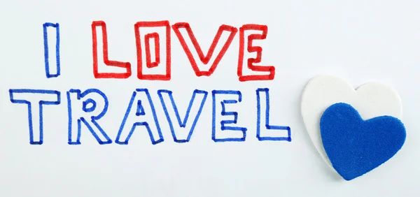 Inscription I love travel on paper close up — Stock Photo, Image