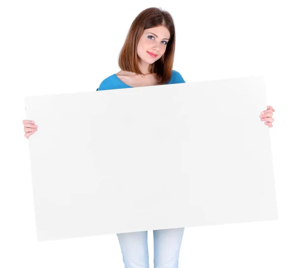 美しい若い女性は白で隔離される空白のポスターを保持 — ストック写真