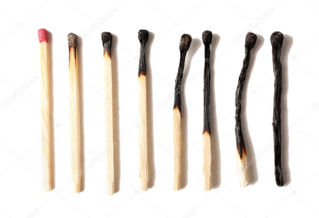Burnt matches isolated on white Stock Photo by ©belchonock 68110073