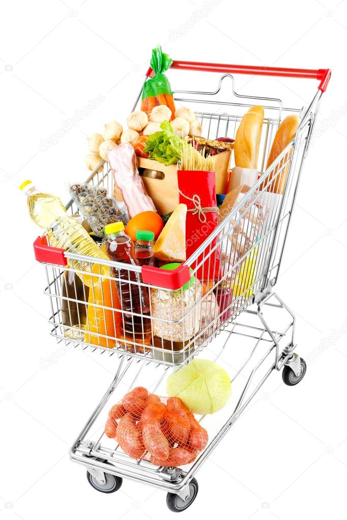 Shopping cart full with various groceries isolated on white 