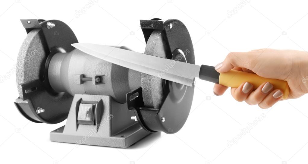 Sharpening knife process isolated on white