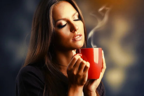 Beautiful young woman with cup of coffee — Stock Photo, Image