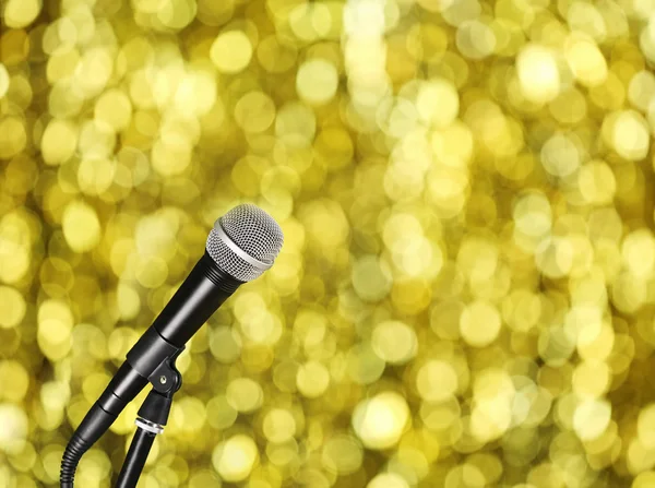 Microphone on bright yellow background — Stock Photo, Image