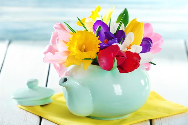 Beautiful spring flowers on wooden table, closeup — Stock Photo, Image