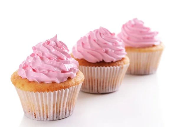 Deliciosos cupcakes isolados em branco — Fotografia de Stock