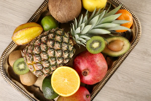 Assortment of fruits on wooden table — Stock Photo, Image