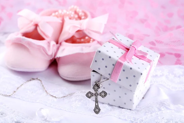 Baby shoe and cross for Christening — Stock Photo, Image