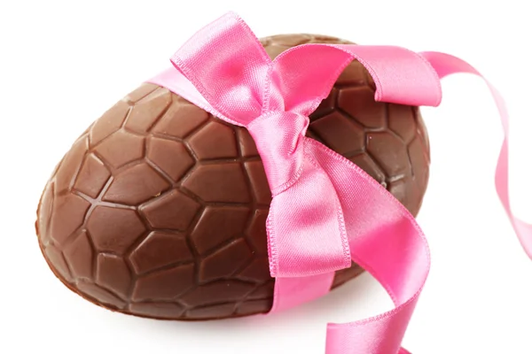 Chocolate Easter egg with color ribbon bow, closeup — Stock Photo, Image