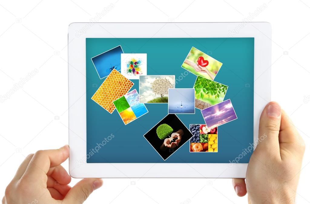 Hands holding tablet PC with different pictures on screen isolated on white