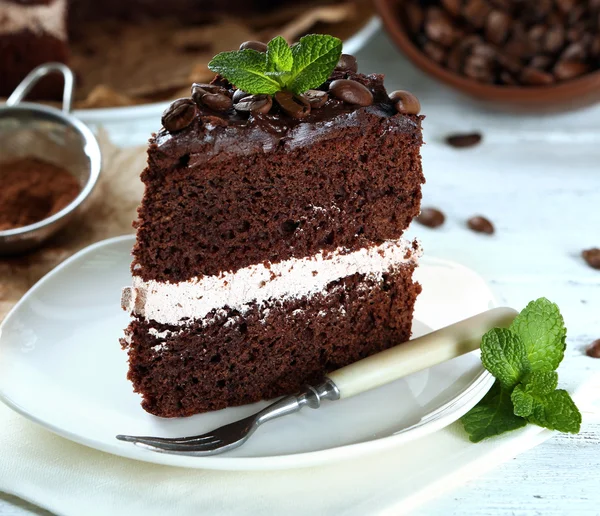 Delicious chocolate cake on table close-up — Stock Photo, Image