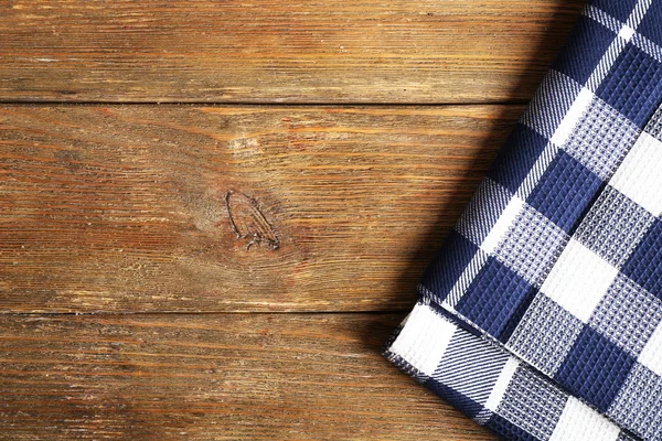 Napkin on wooden background — Stock Photo, Image