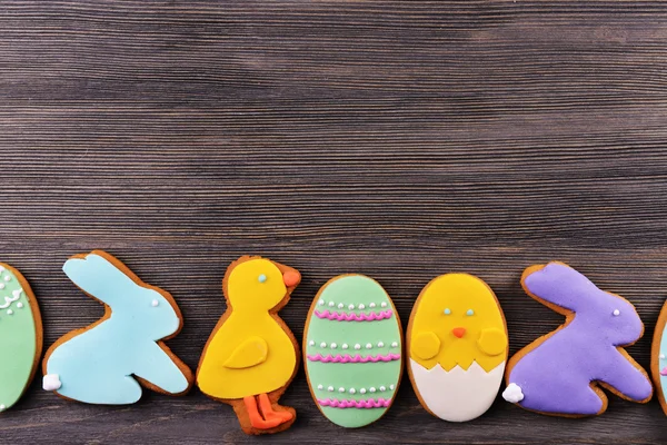 Delicious Easter cookies on wooden background — Stock Photo, Image