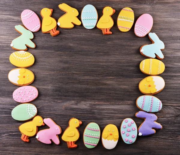 Delicious Easter cookies on wooden background — Stock Photo, Image