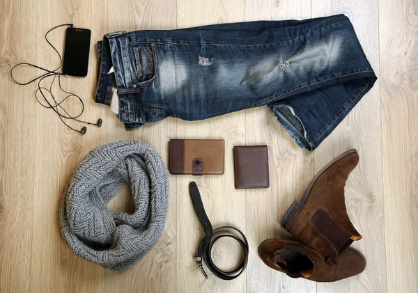 Still life of casual man on wooden background — Stock Photo, Image