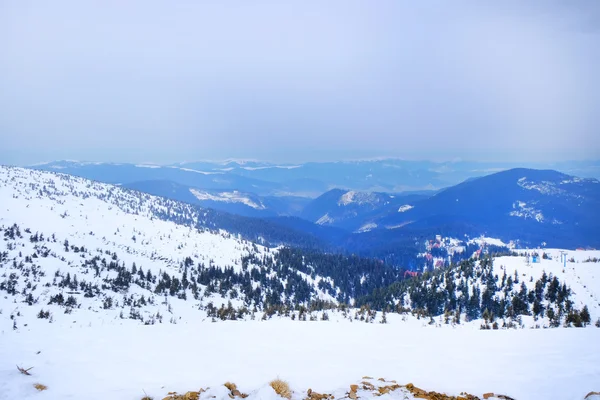 Snowy mountains in wintertime — Stock Photo, Image