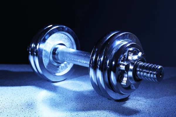 Dumbbells on gray background — Stock Photo, Image