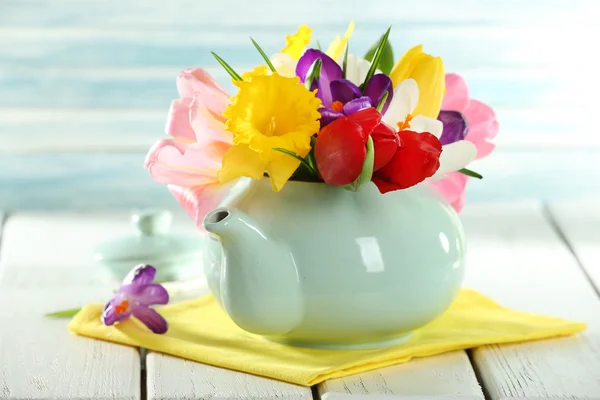 Beautiful spring flowers on wooden table, closeup — Stock Photo, Image