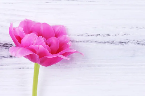 Pink tulips on wooden background — Stock Photo, Image