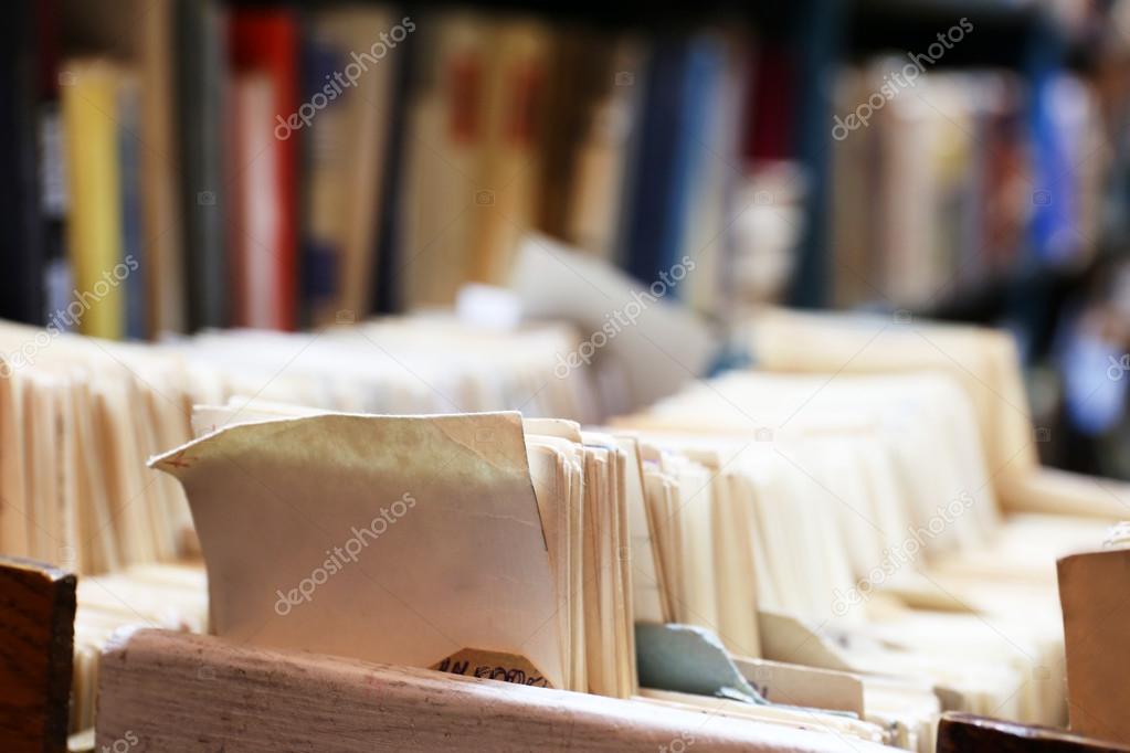 Catalog cards and books in library, closeup