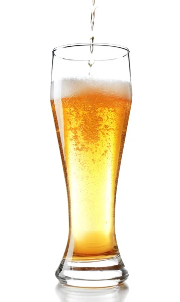 Pouring beer into glass isolated on white — Stock Photo, Image