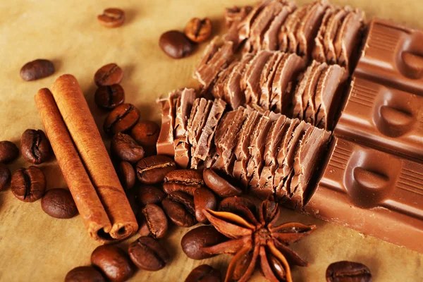 Chopped chocolate on parchment, closeup — Stock Photo, Image