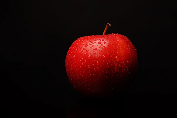 Apple on black background — Stock Photo, Image