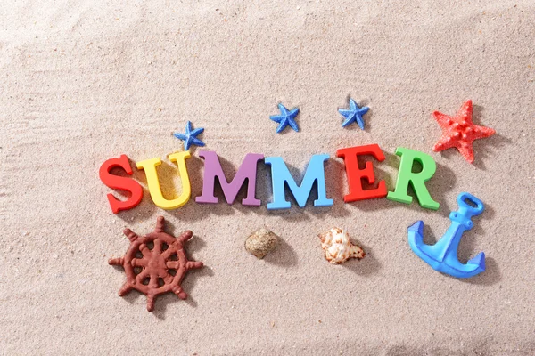 Word summer on beach background — Stock Photo, Image