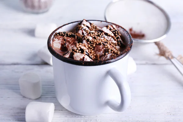 Mug of cocoa with marshmallows on wooden background — Stock Photo, Image